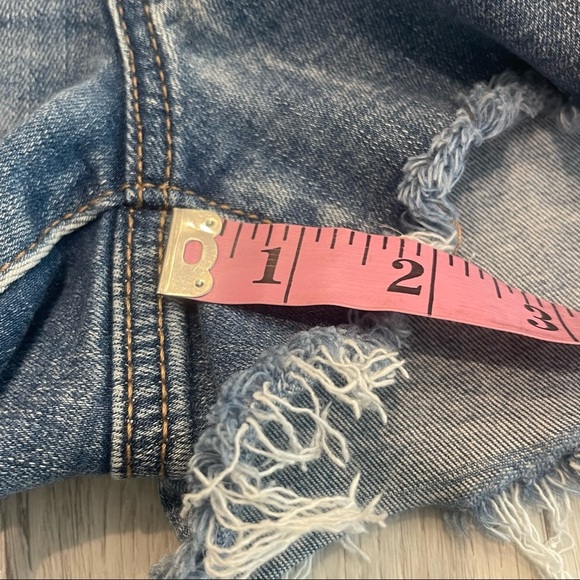 AMERICAN EAGLE Next Level Stretch Hi-Rise Shortie Distressed Blue Jean Shorts - Picture 5 of 9